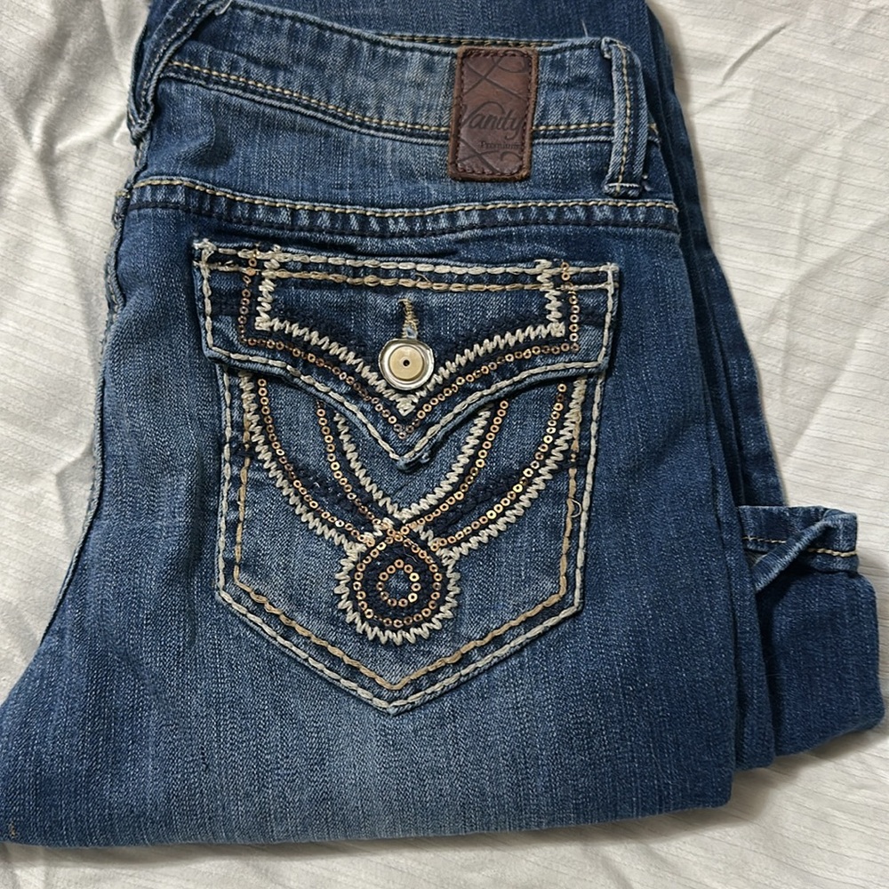 Vanity Distressed Flare Jeans in Dark Blue